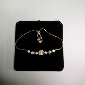 Elegant Gold and Silver Flower Bracelet